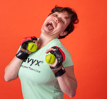 Frau mit grünen Handschuhen – Hävyx Trainingsdetail